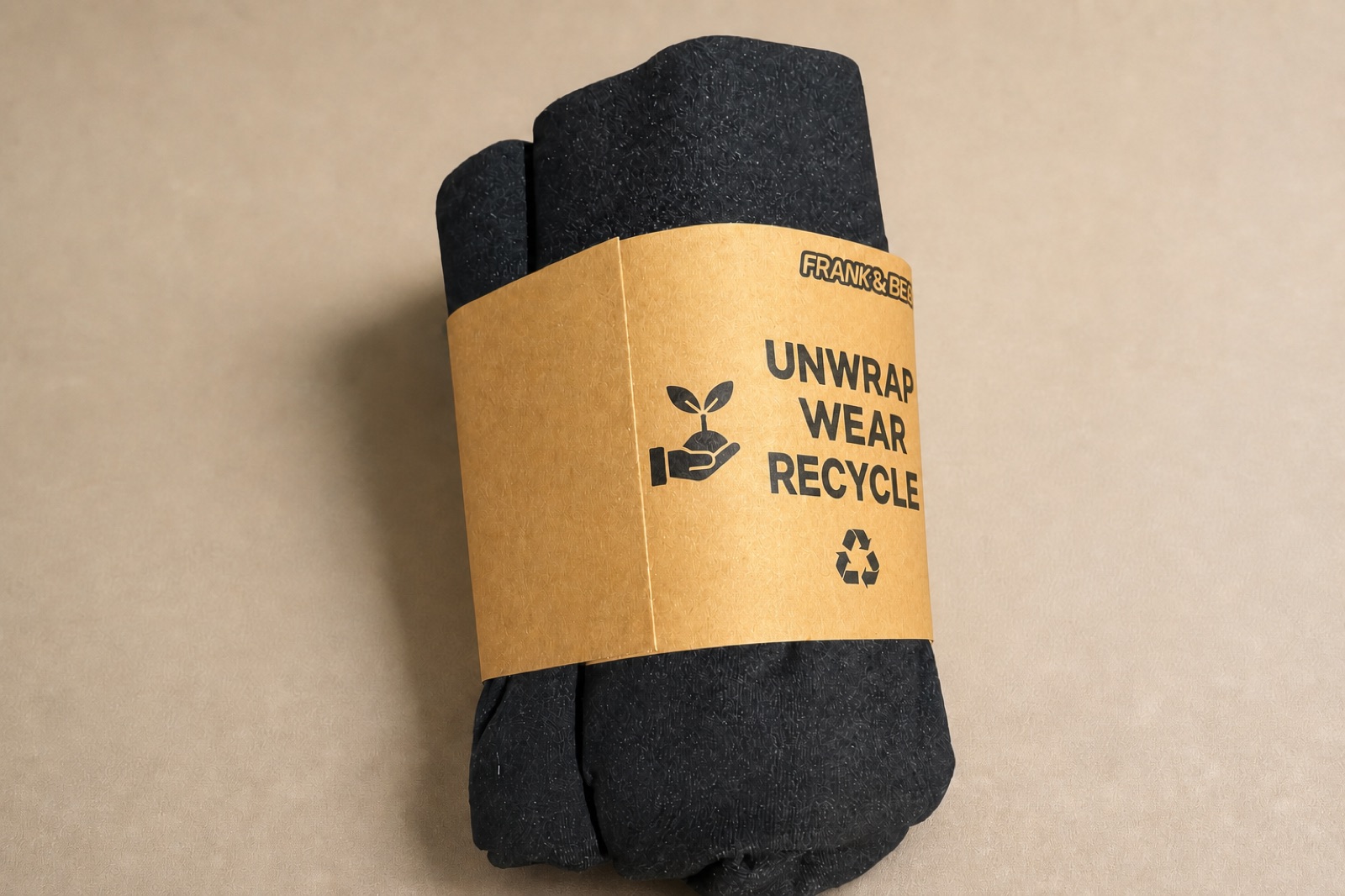 Three-quarter view of the recyclable cardboard sleeve around folded underwear